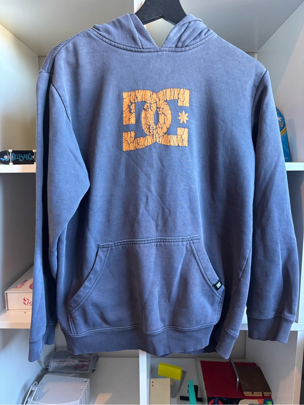 DC boys Blue Pullover Hoodie with Faded Gold Logo